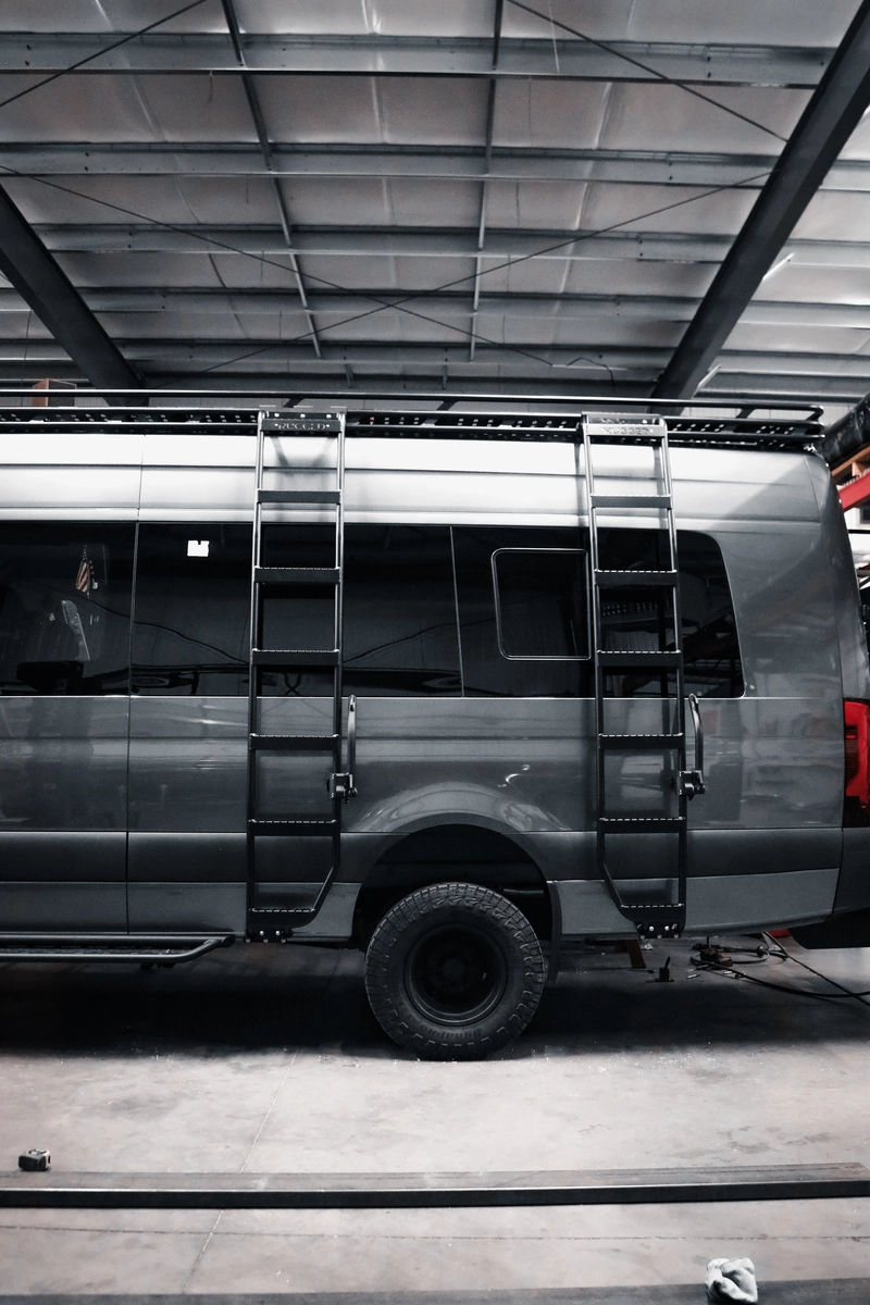 Rugged Design Concepts Duo side ladder for a Mercedes sprinter high roof with surf board hooks