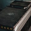 Dark grey Mercedes Sprinter Van outfitted with Rugged Design Concepts Roof Rack and Skyliner paired with KC Hilites Light bar