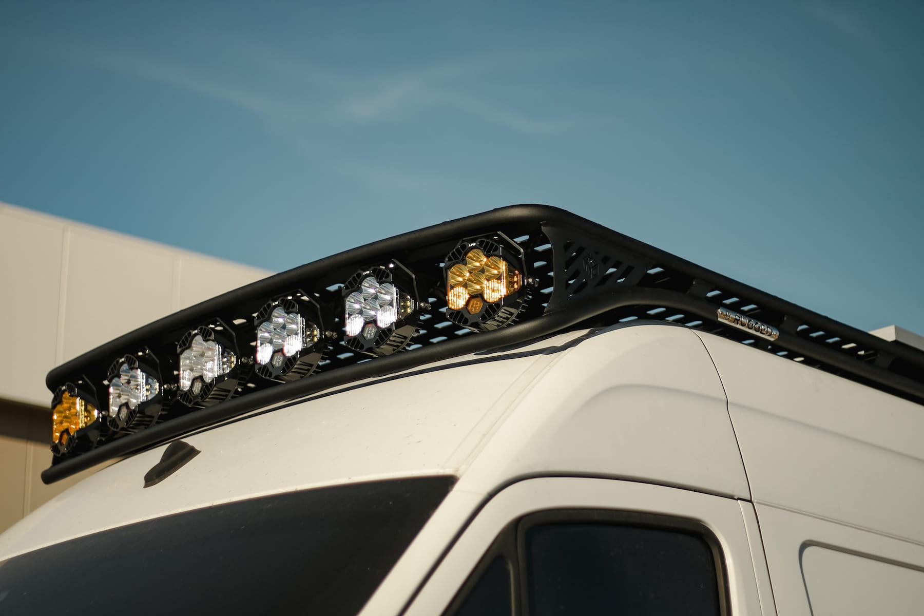 rugged sprinter roof rack with baja designs lp6 led light pods on a 170 wheelbase sprinter van